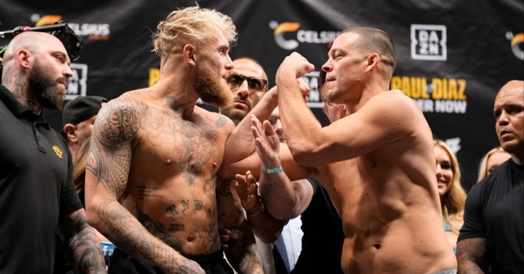 Jake Paul and Nate Diaz have a tense face-off at the weigh-in for their boxing match.