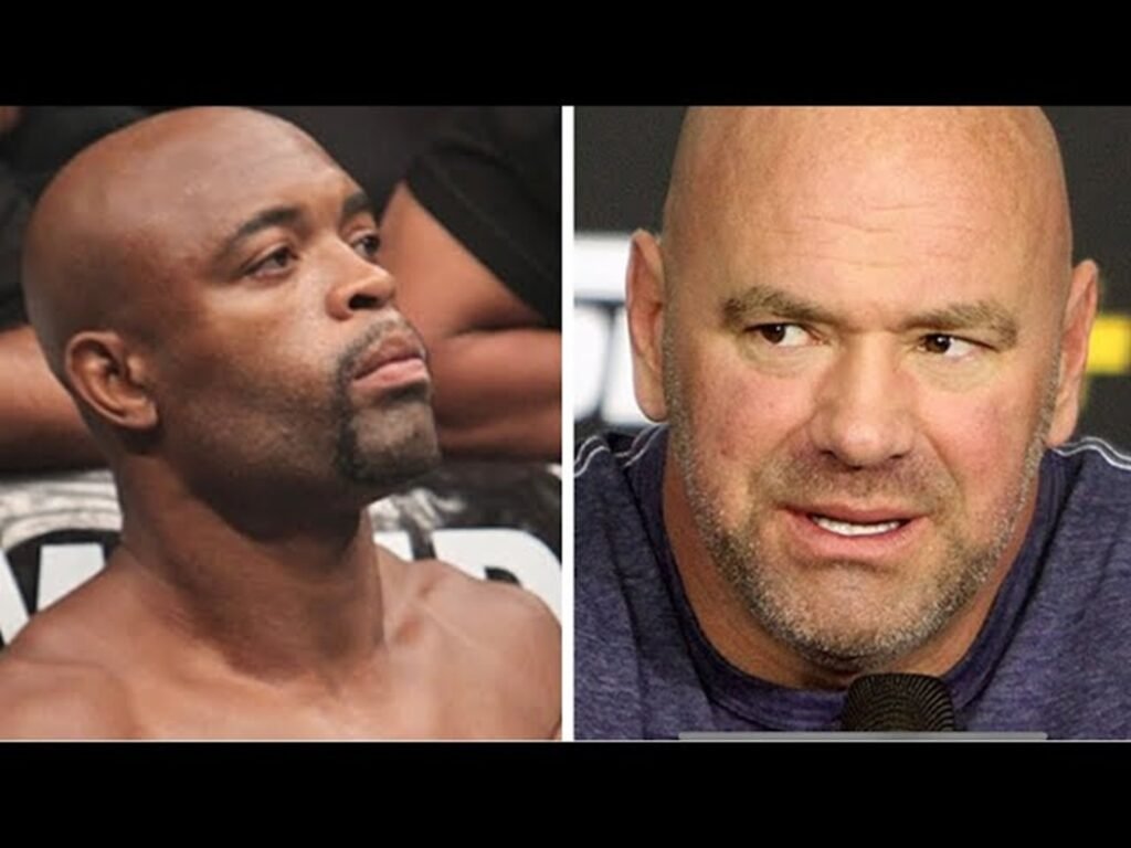 Anderson Silva (luchador) y Dana White (presidente UFC). Ambos calvos y con barba, mirando en direcciones opuestas.