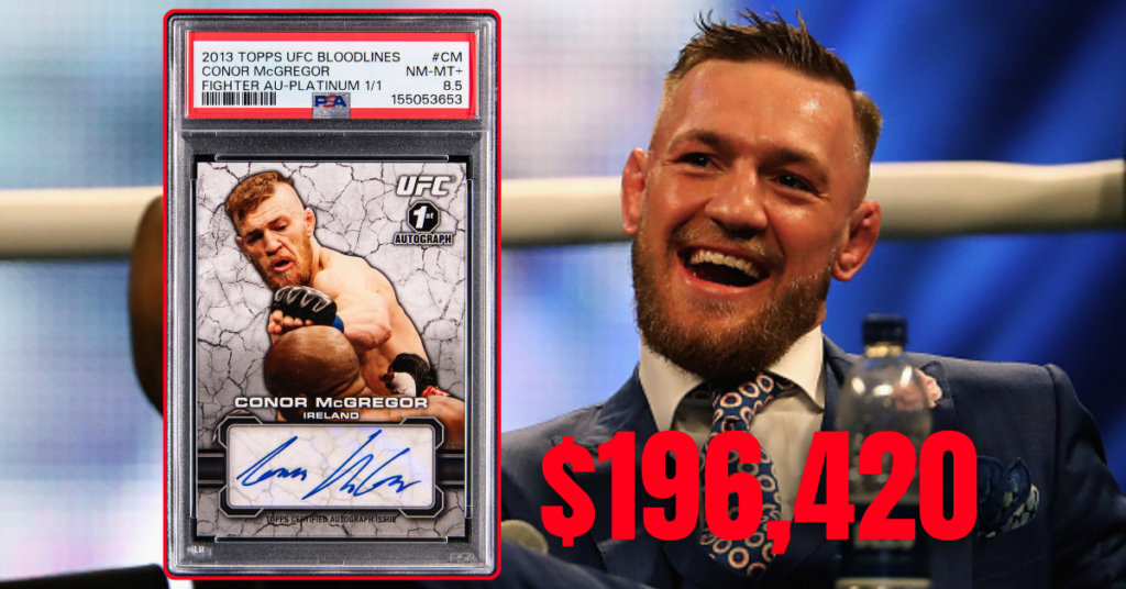 Conor McGregor sonríe junto a su cromo autografiado UFC 1/1 Topps Bloodlines, valorado en $196.420.