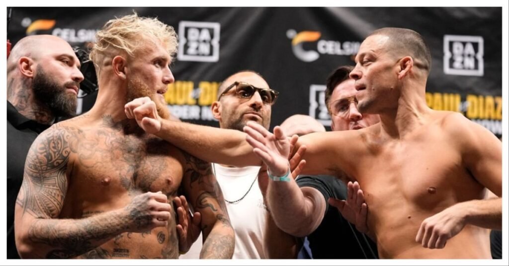 Intenso careo entre Jake Paul (rubio, tatuado) y Nate Diaz (rapado) en el pesaje, con oficiales interponiéndose.