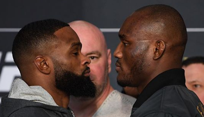 Tyron Woodley y Kamaru Usman en un careo de MMA. Miradas intensas con Dana White al fondo.